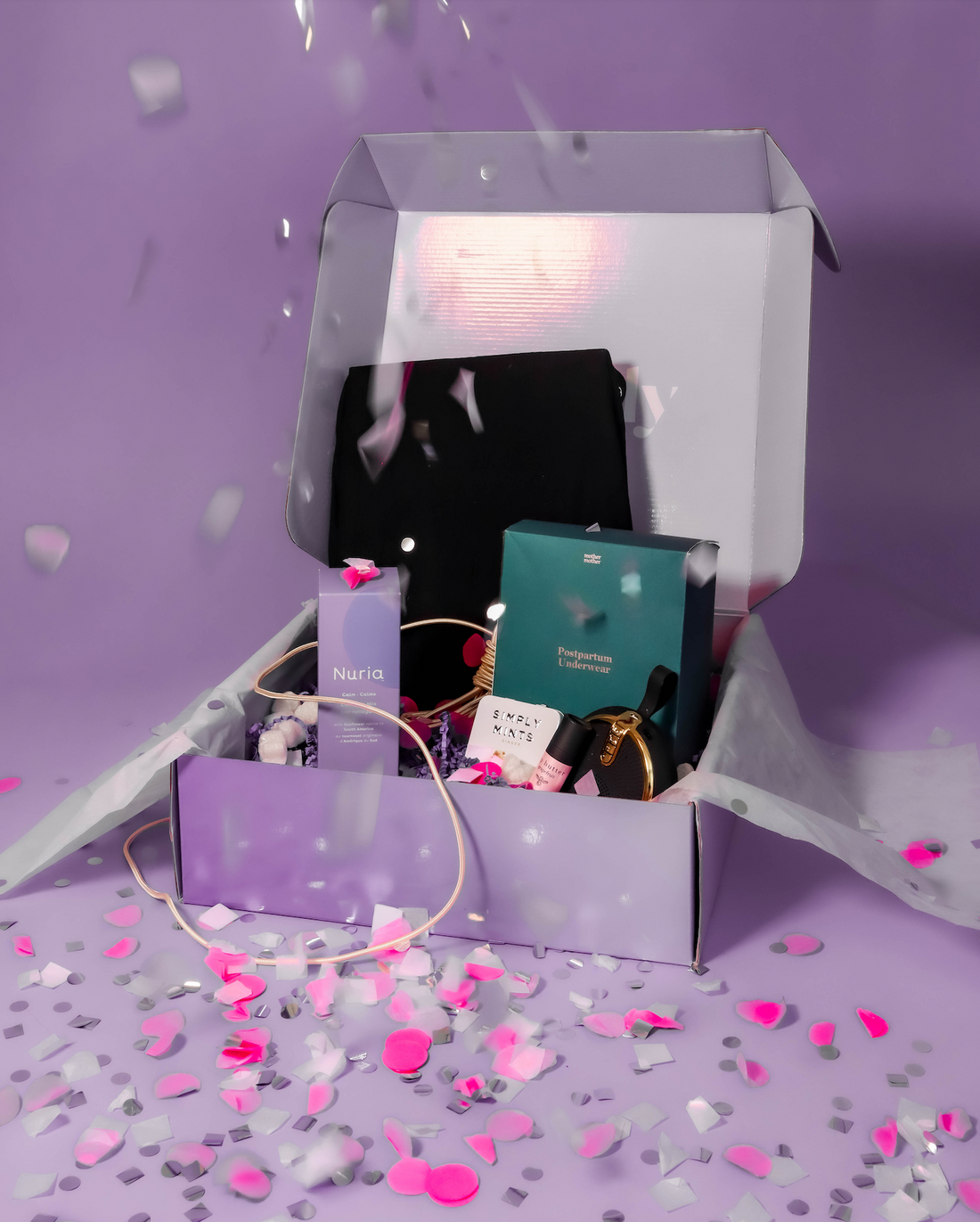 hospital bag essentials box with maternity apparel and soothing treats for new moms