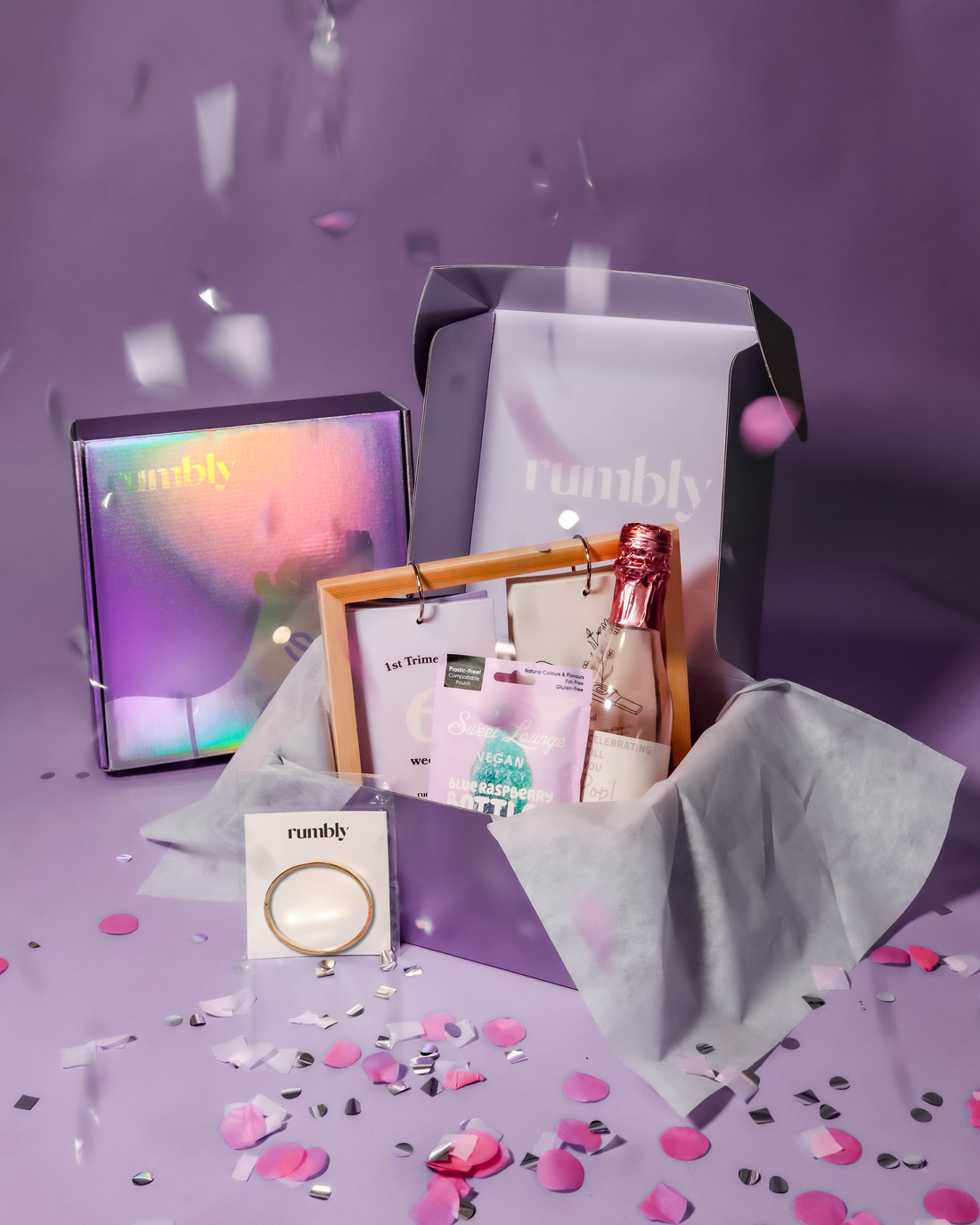 new mom-to-be pregnancy box with pamper gifts inside